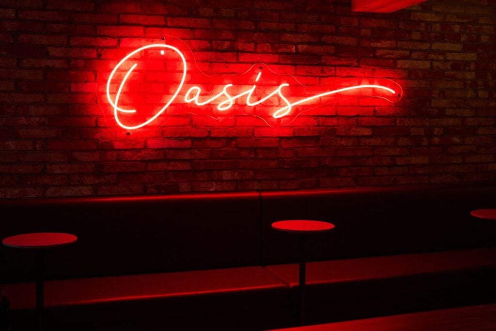 Alex Pun wants to make cocktails fun and affordable again at new modern dive bar Oasis 2 Alex Pun Bar Oasis LED sign